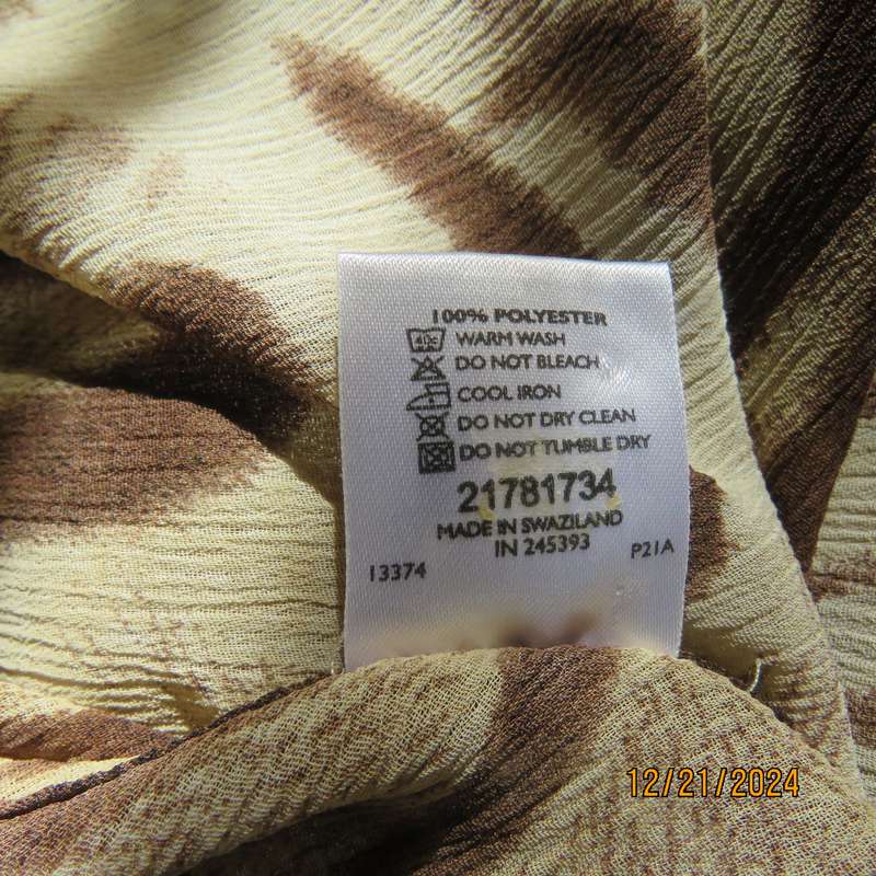 Sexy strappy top in brown/cream animal top in crinkled polyester.Empire front.Size 38.Brand new con.