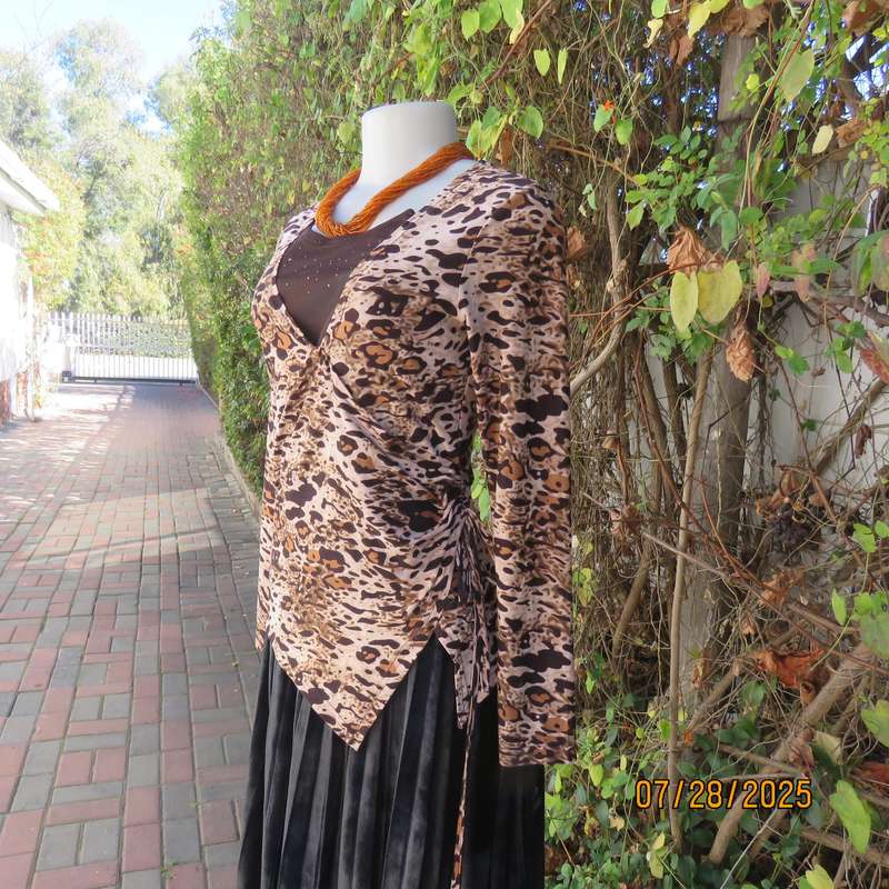 Animal print fold over front long sleeve brown-beige-tan top. Drawstring in side. Size 34.