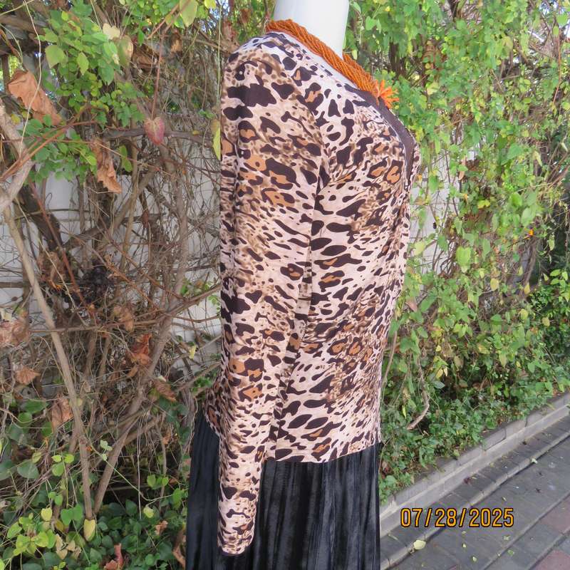 Animal print fold over front long sleeve brown-beige-tan top. Drawstring in side. Size 34.