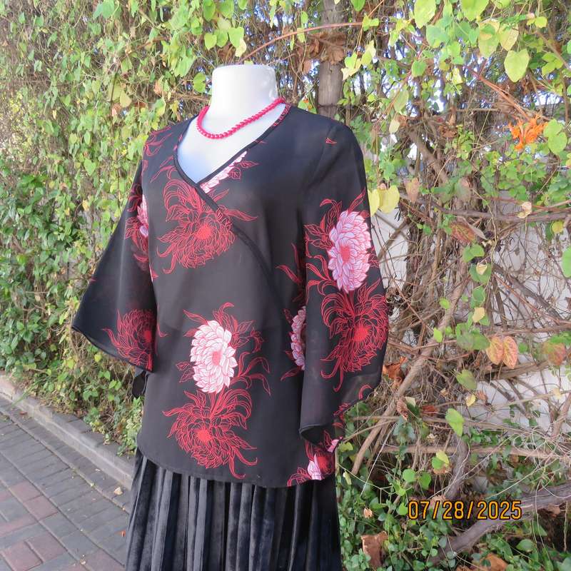 ASPIRE black polyester with red-white bold floral pattern. Unique sleeves. Size 36
