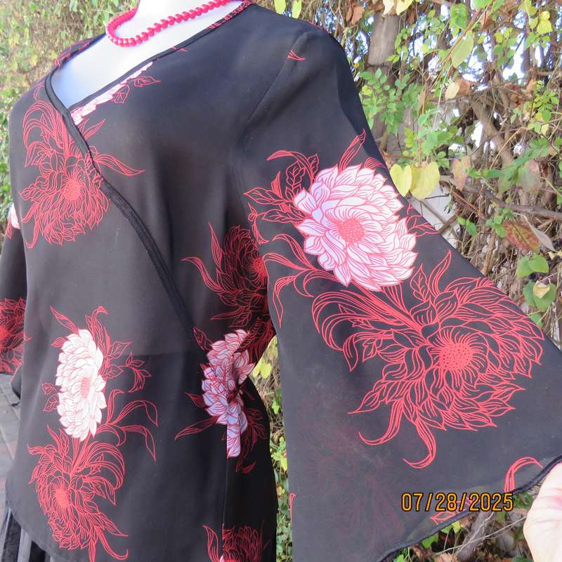ASPIRE black polyester with red-white bold floral pattern. Unique sleeves. Size 36