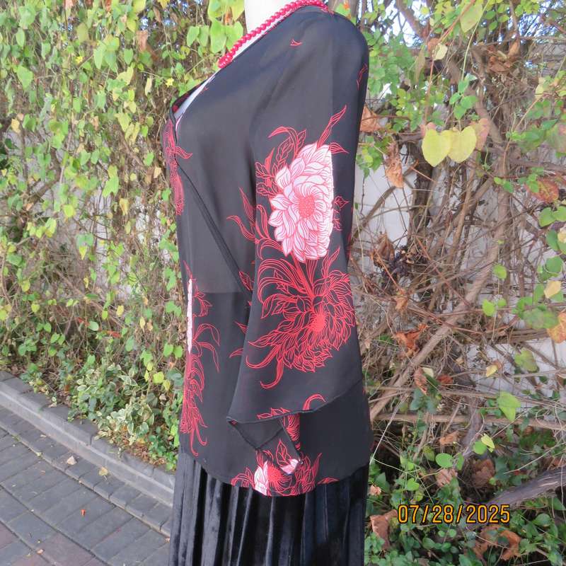 ASPIRE black polyester with red-white bold floral pattern. Unique sleeves. Size 36