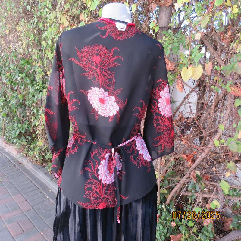 ASPIRE black polyester with red-white bold floral pattern. Unique sleeves. Size 36