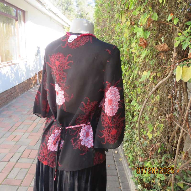 ASPIRE black polyester with red-white bold floral pattern. Unique sleeves. Size 36