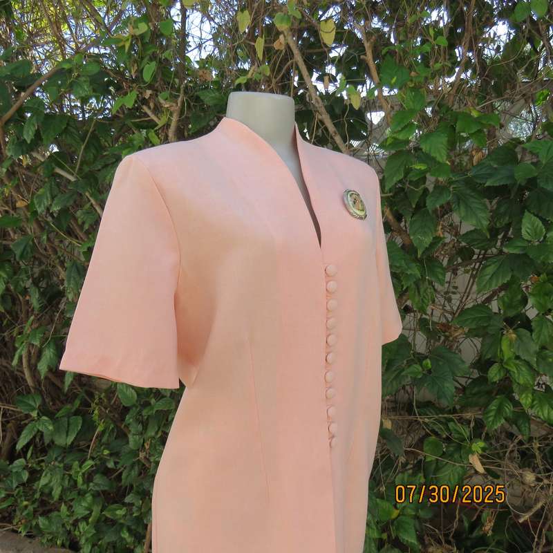 Light apricot colour boutique made long short sleeve tailored jacket. Size 42.