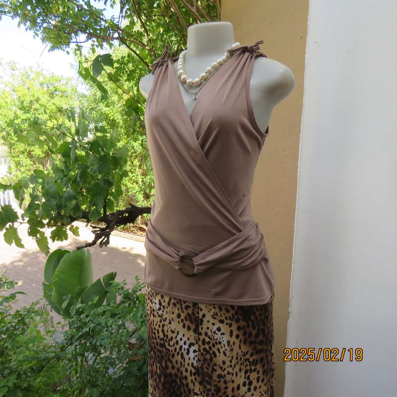 Fawn colour sleeveless ML size 34 top in poly-viscose. Foldover front.Drawstrings on shoulders.
