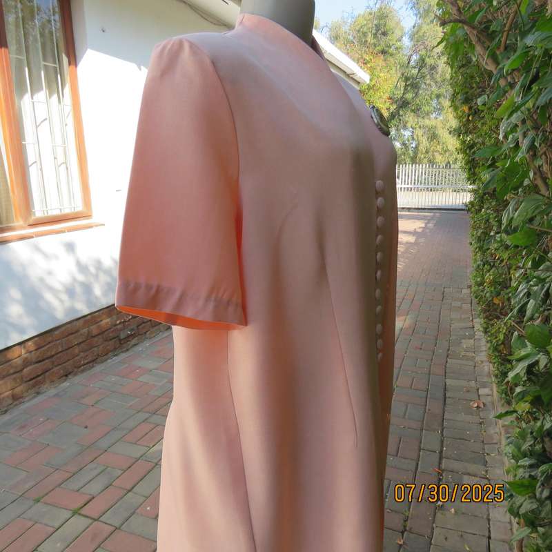 Light apricot colour boutique made long short sleeve tailored jacket. Size 42.