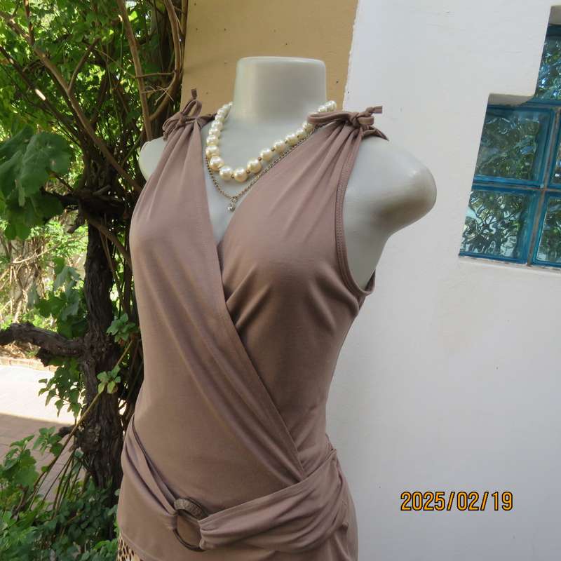 Fawn colour sleeveless ML size 34 top in poly-viscose. Foldover front.Drawstrings on shoulders.