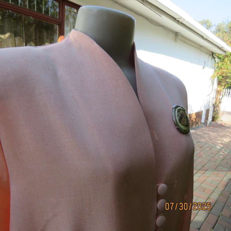 Light apricot colour boutique made long short sleeve tailored jacket. Size 42.