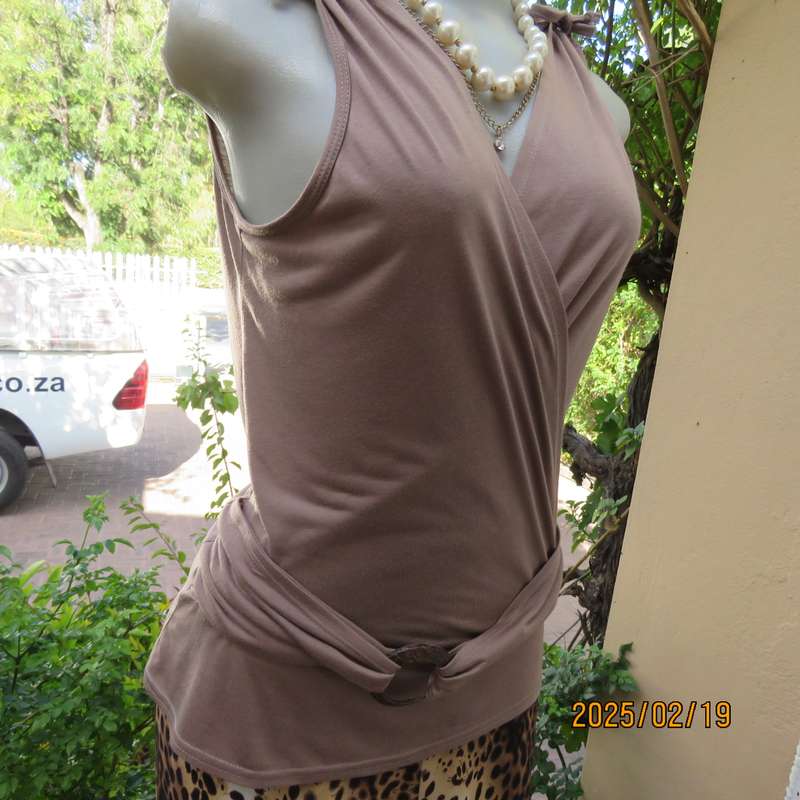 Fawn colour sleeveless ML size 34 top in poly-viscose. Foldover front.Drawstrings on shoulders.
