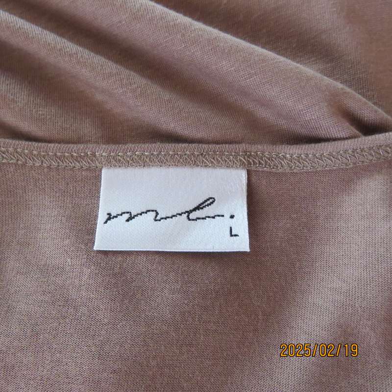 Fawn colour sleeveless ML size 34 top in poly-viscose. Foldover front.Drawstrings on shoulders.