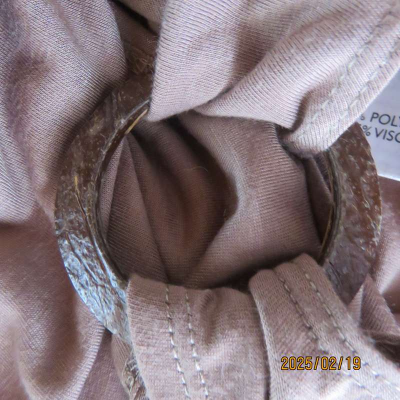 Fawn colour sleeveless ML size 34 top in poly-viscose. Foldover front.Drawstrings on shoulders.
