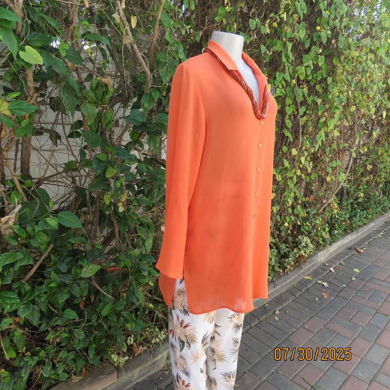 Tangerine crinkled polyester long sleeve button down size 42 top. Open collar