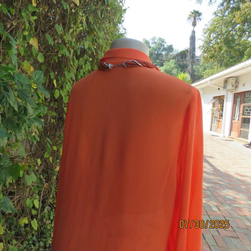 Tangerine crinkled polyester long sleeve button down size 42 top. Open collar