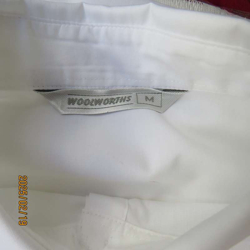 WOOLWORTHS long sleeve white formal shirt. Double foldover cuffs. Pearl front buttons. Size 38-40.