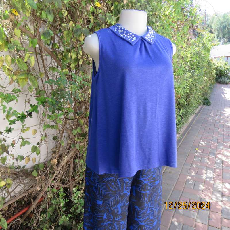 Sweet royal blue loose hanging top with high embellished collar.Size 34 by LEGIT.Opening at back.