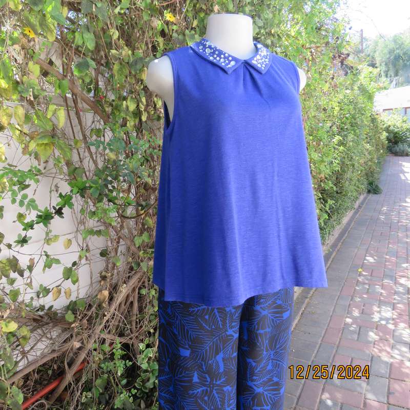 Sweet royal blue loose hanging top with high embellished collar.Size 34 by LEGIT.Opening at back.