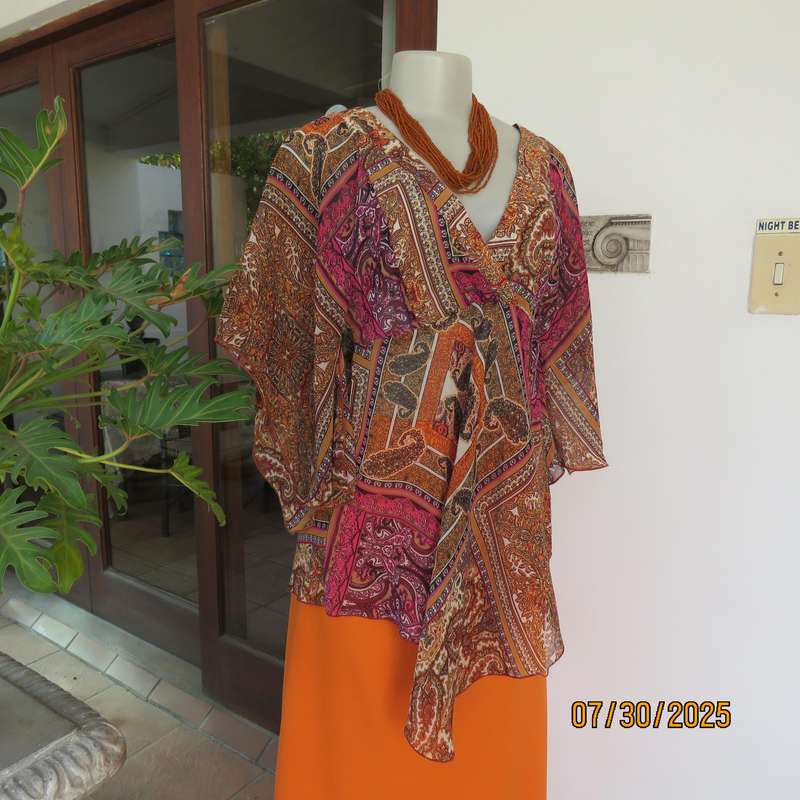 Colourful bo-ho polyester size 34 high-low top with cross over bodice.