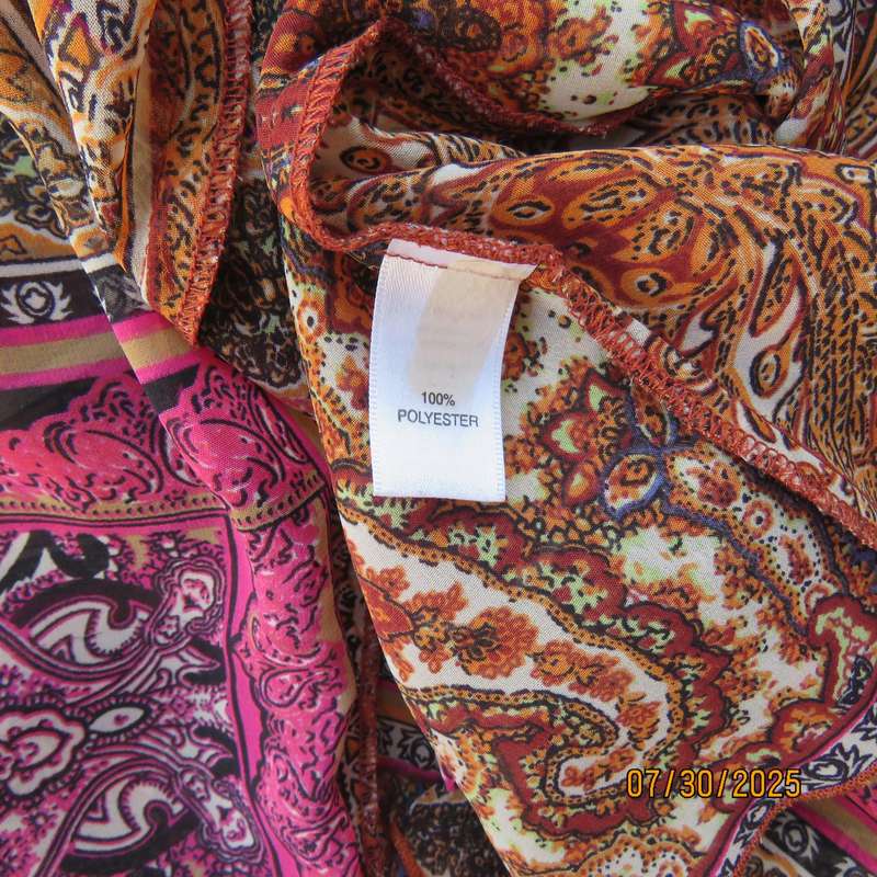 Colourful bo-ho polyester size 34 high-low top with cross over bodice.
