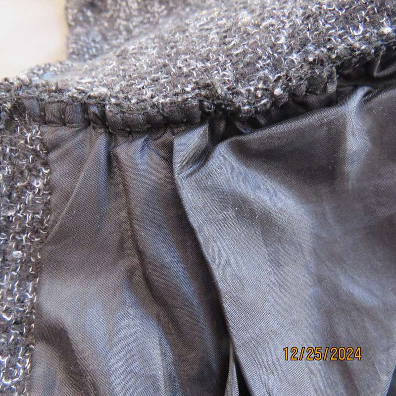 Winter calf length pantsuit in woolen/poly salt/pepper colour fabric. Size 34 by AIMEE.Partly lined.