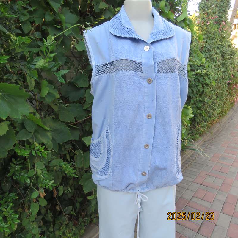 Casual light blue sleeveless cotton button down top. Different fabrics. Size 40. Drawstring hem.