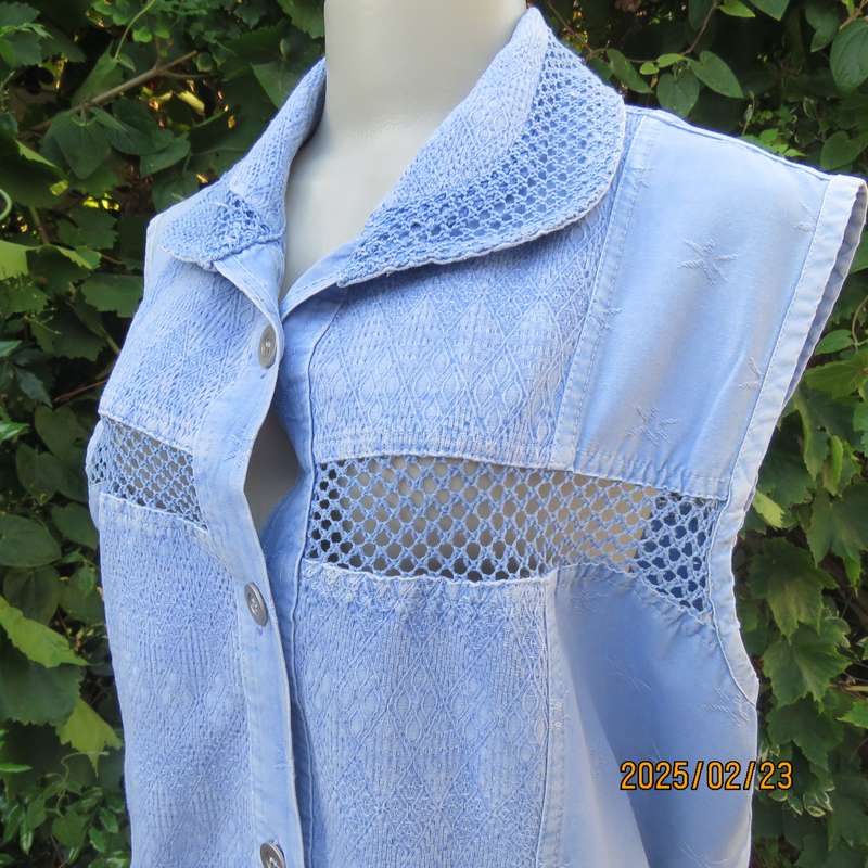 Casual light blue sleeveless cotton button down top. Different fabrics. Size 40. Drawstring hem.