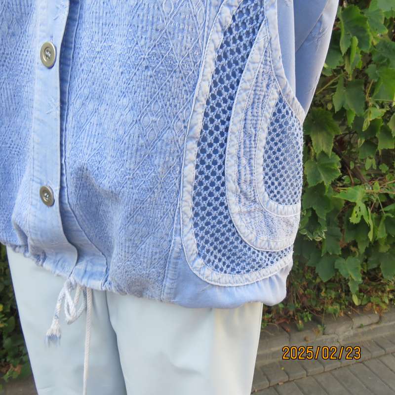 Casual light blue sleeveless cotton button down top. Different fabrics. Size 40. Drawstring hem.