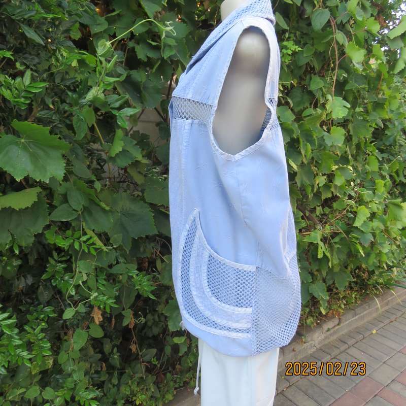 Casual light blue sleeveless cotton button down top. Different fabrics. Size 40. Drawstring hem.