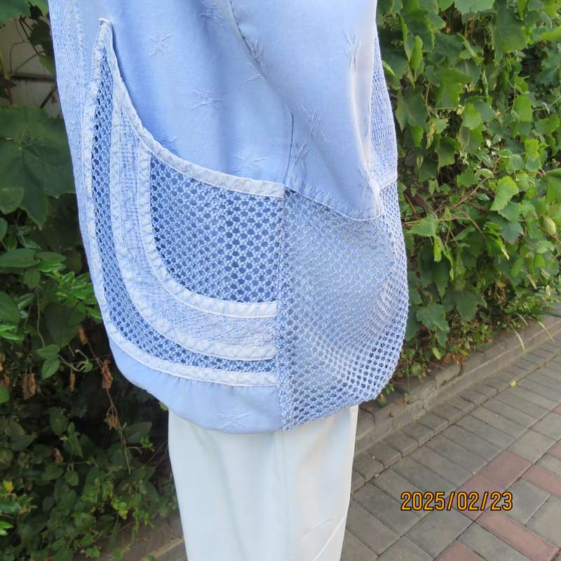 Casual light blue sleeveless cotton button down top. Different fabrics. Size 40. Drawstring hem.