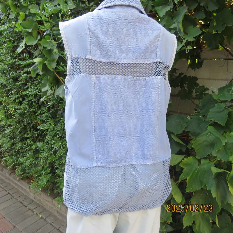 Casual light blue sleeveless cotton button down top. Different fabrics. Size 40. Drawstring hem.