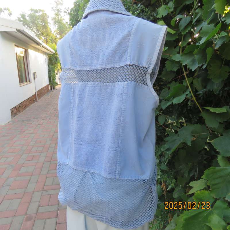 Casual light blue sleeveless cotton button down top. Different fabrics. Size 40. Drawstring hem.