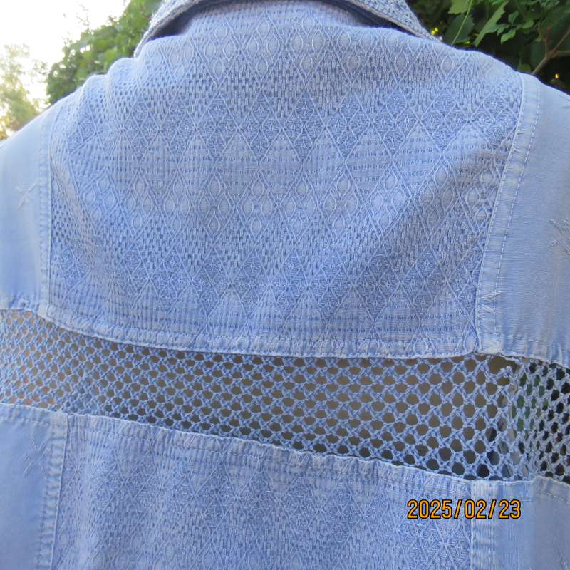 Casual light blue sleeveless cotton button down top. Different fabrics. Size 40. Drawstring hem.