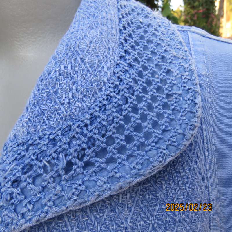 Casual light blue sleeveless cotton button down top. Different fabrics. Size 40. Drawstring hem.