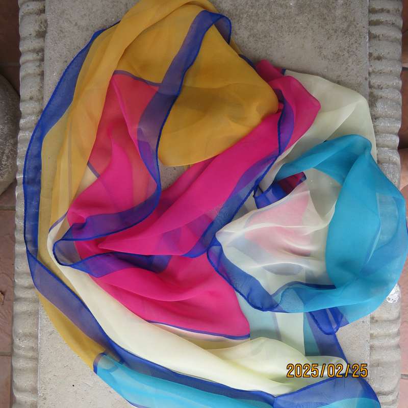Charming colour blocked sheer polyester scarf in blues-yellows-orange and pink.Size 160cm x 50cm.New