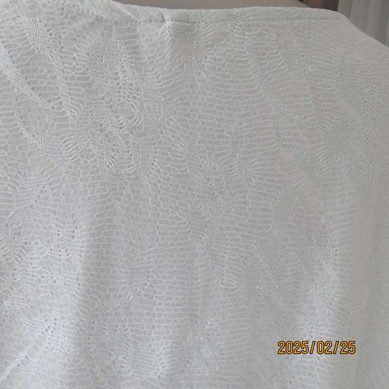 Fabulous pale mint green EXACT size 40 long sleeve slip over top in stretch textured polyester.
