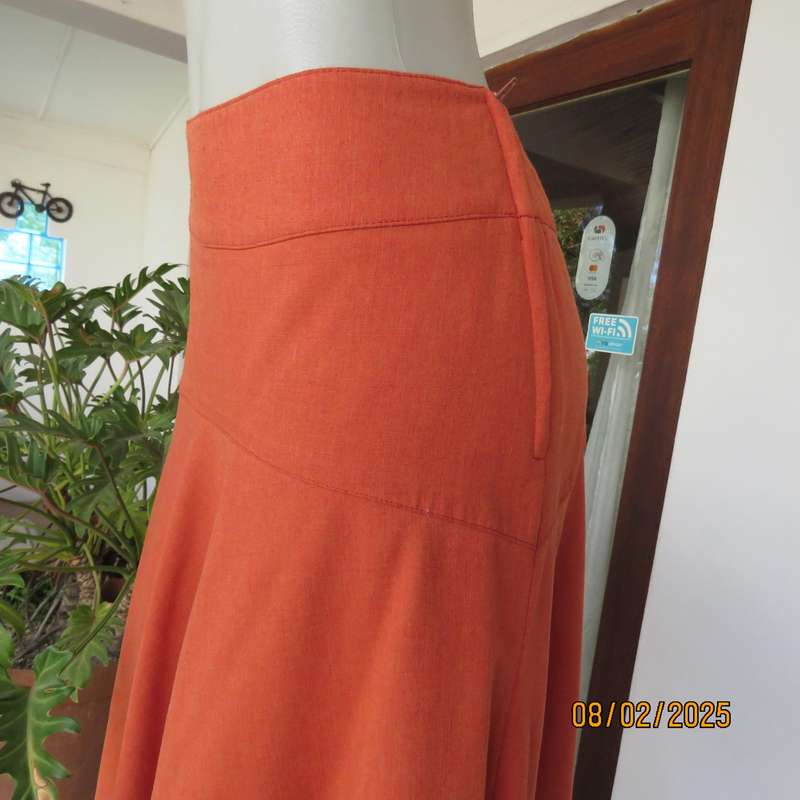 EXACT polyester-rayon high-low burnt orange colour flare skirt. Size 38