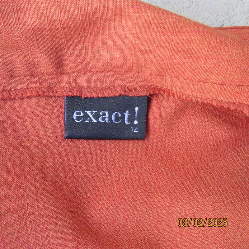 EXACT polyester-rayon high-low burnt orange colour flare skirt. Size 38