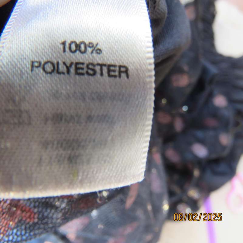 WWW black sheer polyester with oval glitter pattern peplum top. Size 36