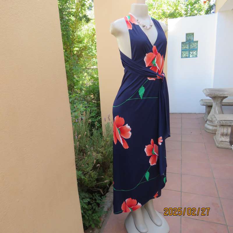 Navy stretch polyester with bold crimson flower pattern tailored fabric with long straps.Size 34-36.