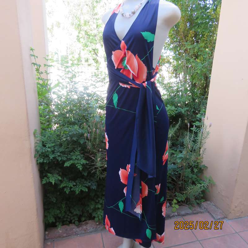Navy stretch polyester with bold crimson flower pattern tailored fabric with long straps.Size 34-36.