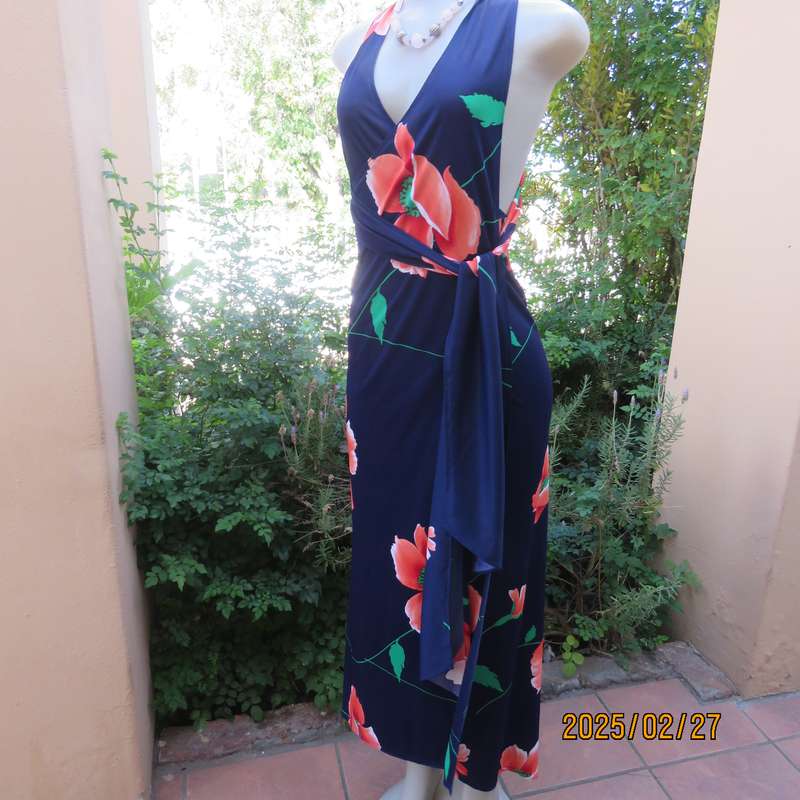 Navy stretch polyester with bold crimson flower pattern tailored fabric with long straps.Size 34-36.