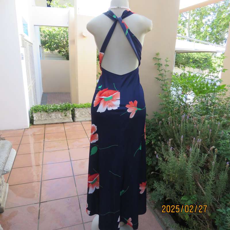 Navy stretch polyester with bold crimson flower pattern tailored fabric with long straps.Size 34-36.