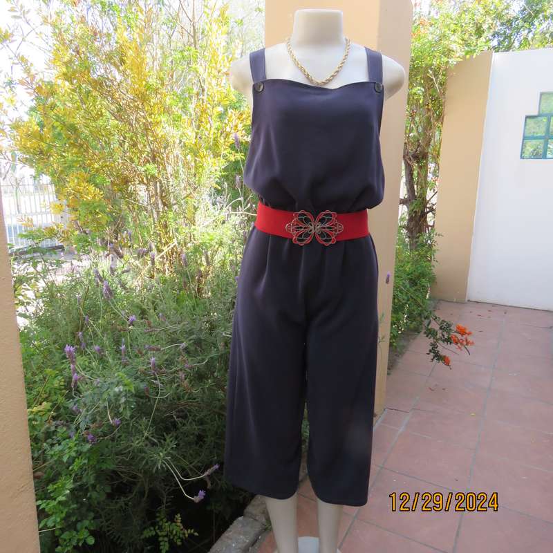 Boutique made dark navy polyester satin like pantsuit size 36. Shoulder straps. As new.