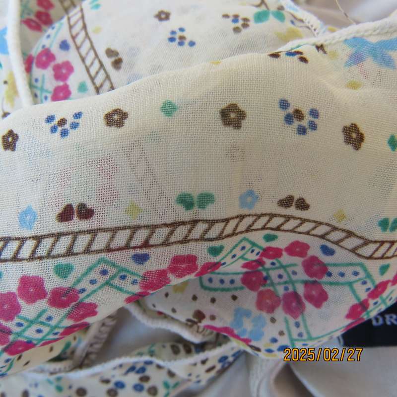 DREA my MINX amazing cream silky poly-nylon nighty. Adjustable straps. Patterned frills. Size 34.