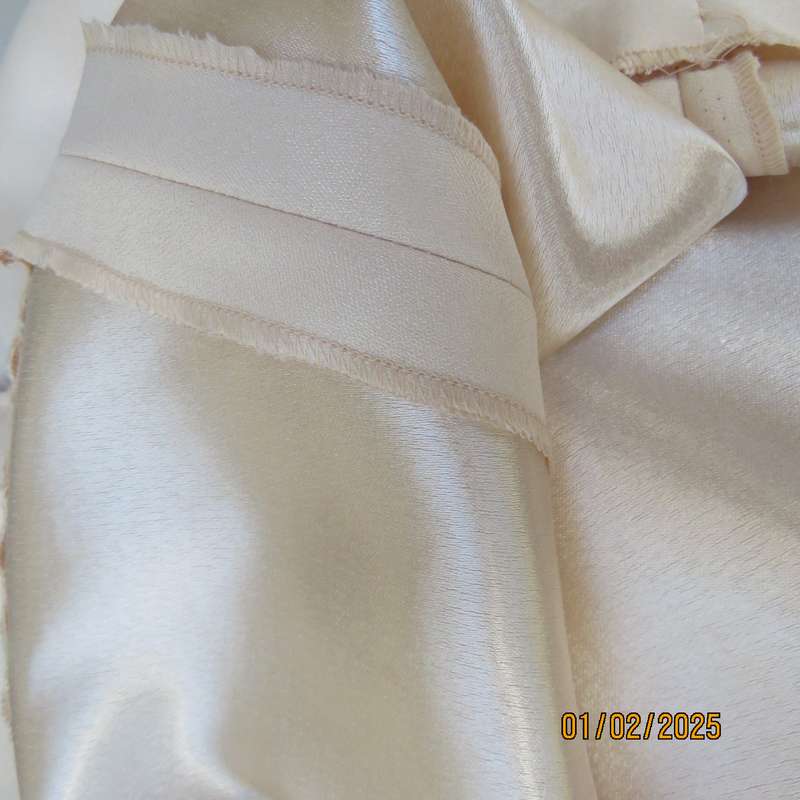 Maxi  A Line skirt in soft buttermilk colour satin/shiny inner. Size 38.Bandless.Back zip.As new