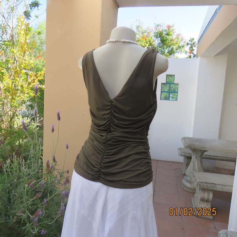 The ultimate in style! Army green draped and gathered summer top. Size 38 by COAST Australia.As new