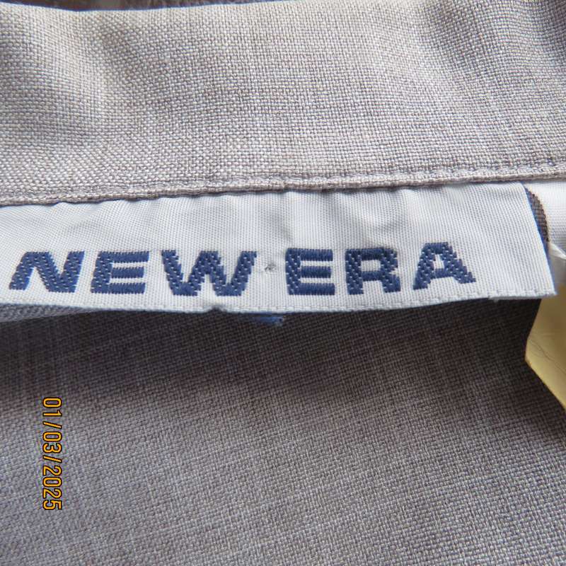 Silver grey mottled polyester short sleeve tailored jacket by NEW ERA size 34. Yoked front. As new