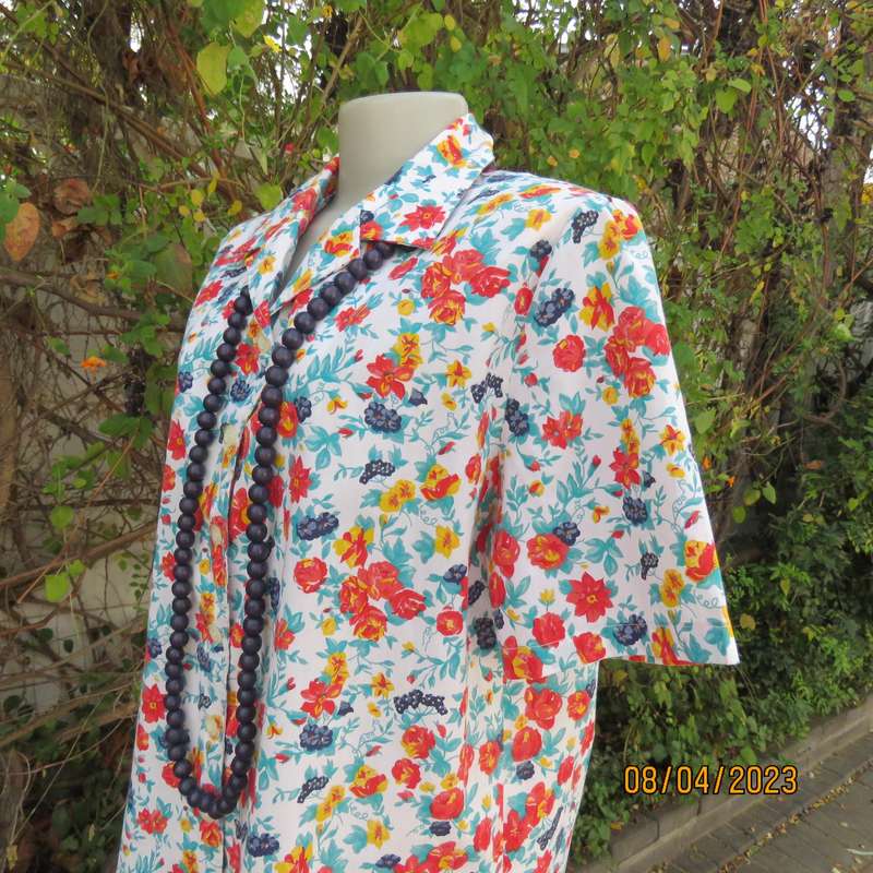 Boutique made white floral button down top in red-blue-yellow. Size 40