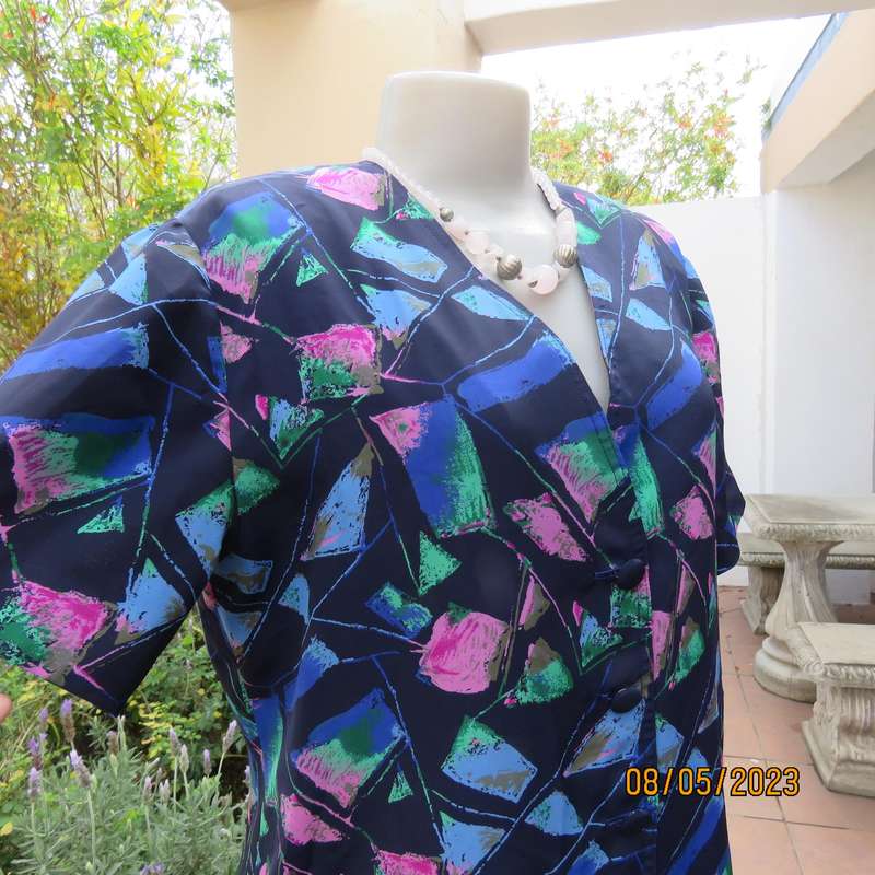 Boutique made navy silky polyester top-short sleeve jacket. Colourful print. Size 40
