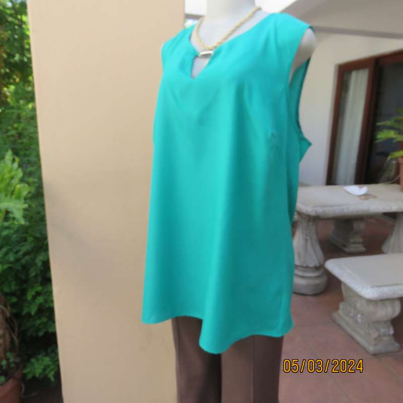 FASHION EXPRESS size 46 emerald green slip over sleeveless top. Round neck with short V-buckle
